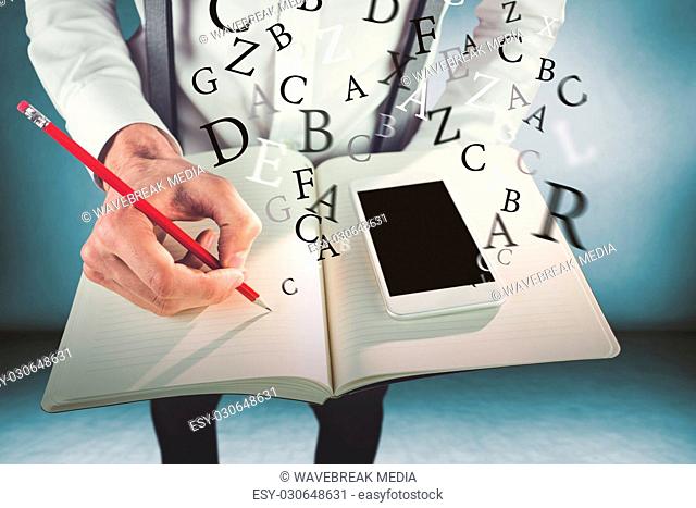 Composite image of man with mobile phone writing on book