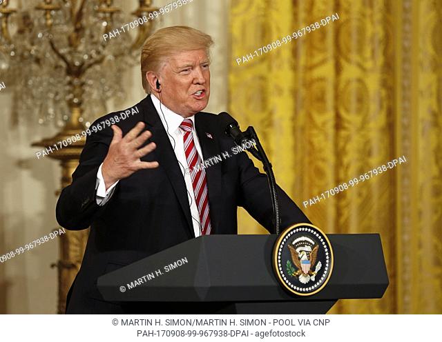 United States President Donald J. Trump and Amir Sabah al-Ahmed al-Jaber al-Sabah of Kuwait hold a joint news conference in the East Room of the White House
