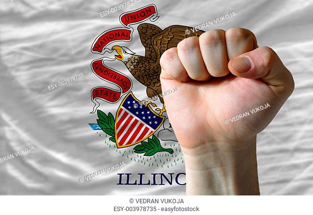 us state flag of illinois with hard fist in front of it symboliz