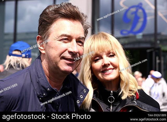 RUSSIA, MOSCOW - MAY 21, 2023: Singers Valery Syutkin and Valeriya pose before planting out wild cherry trees in Dynamo Park to mark the Dynamo Moscow centenary...