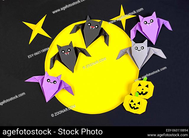 Happy Halloween greetings with bats and pumpkins. Concept of decor for Halloween