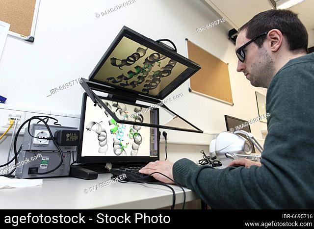 Heinrich-Heine-University, Theoretical Pharmacy Group Prof. Gohlke, PhD student at 3D monitor with 3D mouse, Düsseldorf, Germany, Europe