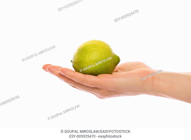 Hand with lemon isolated on white background