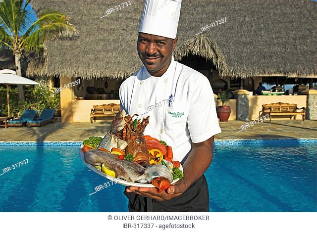 Chef with seafood at Matemo Island Resort, Quirimbas Islands, Mozambique, Africa