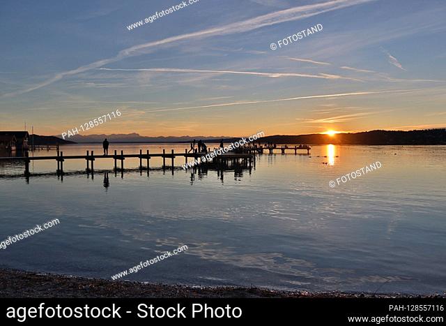 Percha, Germany January 2020: Impressions Percha - Starnberger See - January 2020 Percha, Percha Beach am Starnberger See with sunset | usage worldwide
