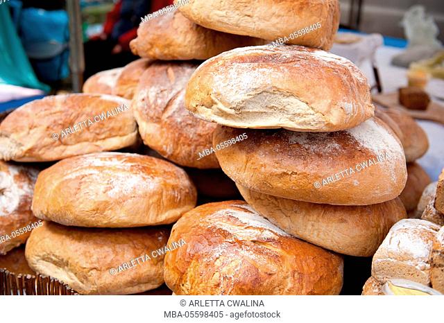 Presentation of bakery products, Heap of breads variety at festival of world breads, nobody, Warsaw, Poland, March 23, 2014