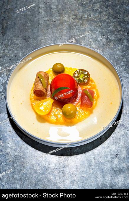 Tuna with variations of tomatoes and faux olives