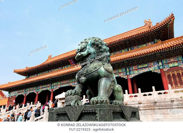 bronze lion guardian statue in front of Gate of Supreme Harmony in Forbidden City