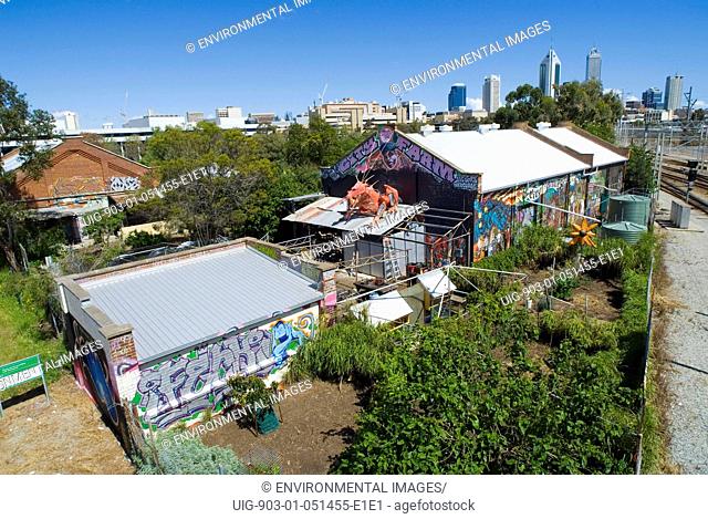 General view of Perth City farm - next to railway line, high-rise city skyline in back ground, Perth, Western Australia