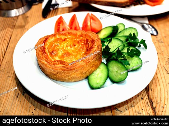 Chicken pie with vegetables photographed close up