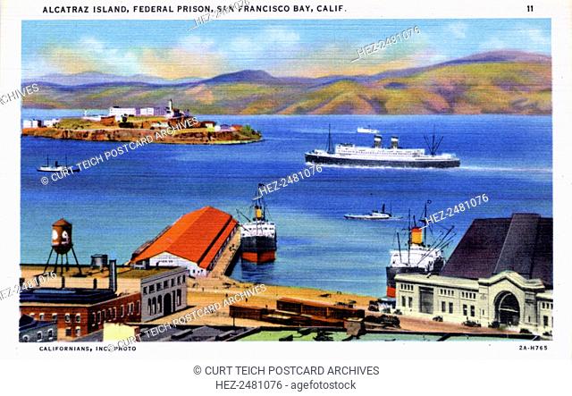 Alcatraz Island, San Francisco Bay, California, USA, 1932. Vintage linen postcard showing Alcatraz Island. A ship cruises the bay and two others are docked at...