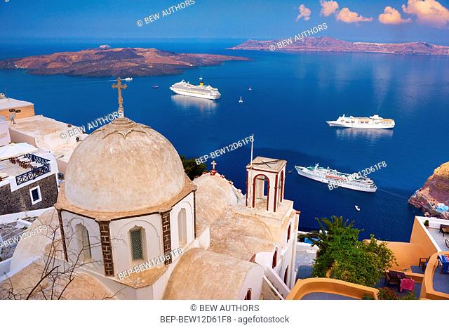 Greece, Santorini, greek island on the Cyclades archipelago. Byzantine church in Fira and view on the islands Nea Kameni, Thirasia