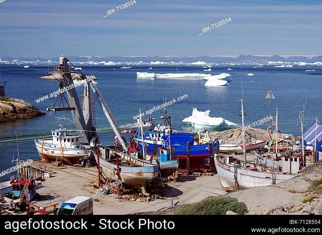 Fishing boats lying on dry land, Ilulissat, Artkis, Greenland, Denmark, North America