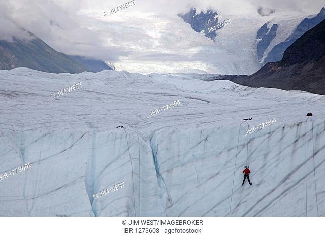 Ice climber on the Root Glacier in Wrangell-St. Elias National Park, Kennicott, Alaska, USA