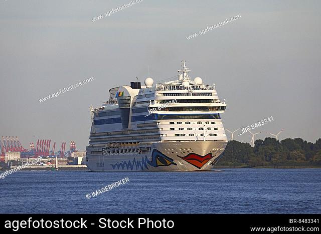 Cruise ship AIDA Sol leaving the port of Hamburg in the evening light on the Elbe, Hamburg, Germany, Europe