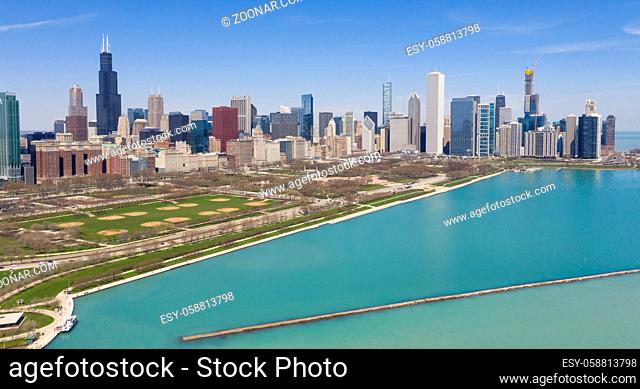 Emerald green Lake Michigan water frames the downtown city skyline of Chicago Illinois USA