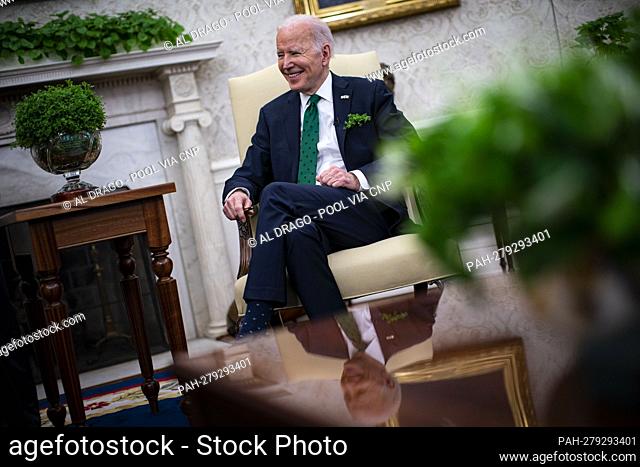 U.S. President Joe Biden speaks while meeting virtually with and Micheal Martin, Ireland's prime minister, not pictured, in the Oval Office of the White House...