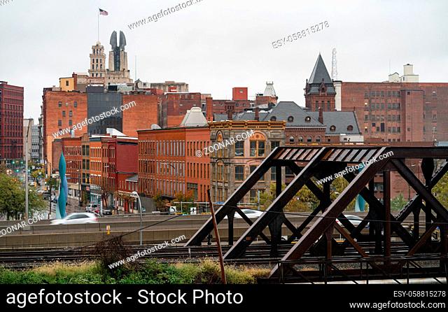 View over the train tracks and highway to the buildings of main street in downtown Rochester New York