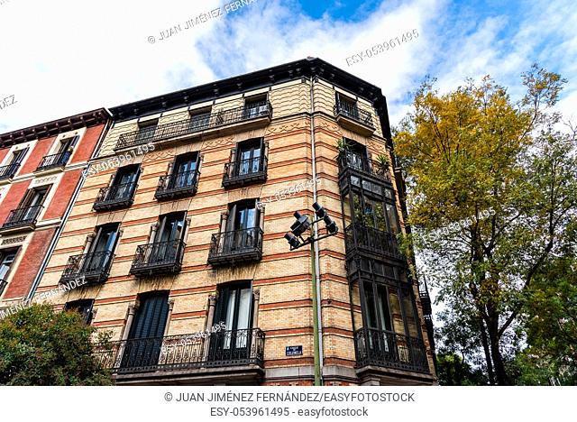 Old luxury residential buildings with balconies and enclosed balconies in Salamanca district in Madrid