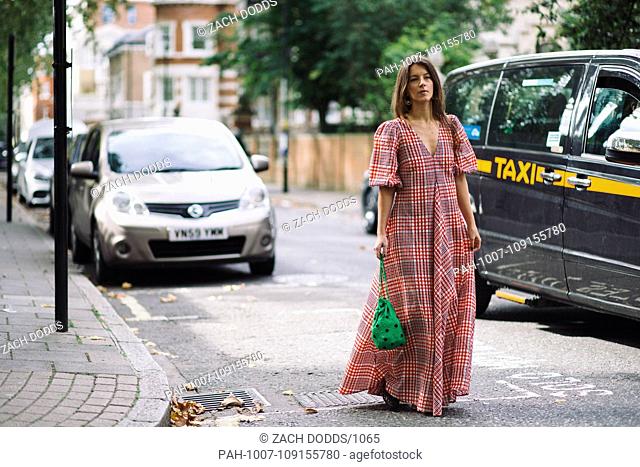 A chic showgoer posing outside the Preen by Thornton Bregazzi runway show during London Fashion Week - Sept 16, 2018 - Photo: Runway Manhattan ***For Editorial...
