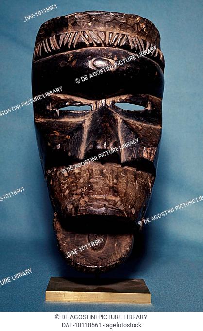 Wooden dance mask with articulated lower jaw used by the Guere people, art from the Ivory coast.  Private Collection