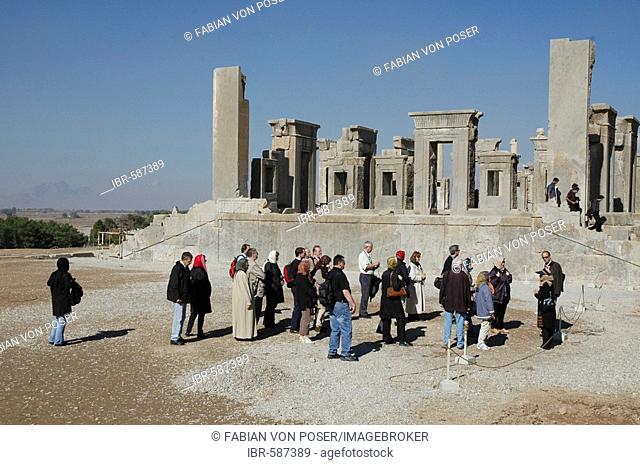Tourists in front of Dareios palace, Persepolis, Iran