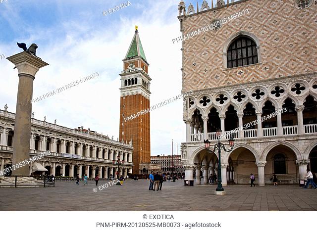 Bell tower and palace at a square, St Mark's Campanile, Doges Palace, St. Mark's Square, Venice, Veneto, Italy