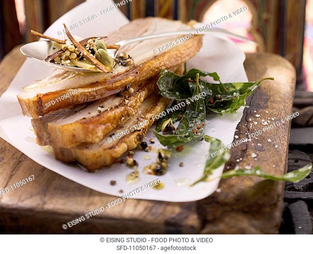 Roast pork belly with spices