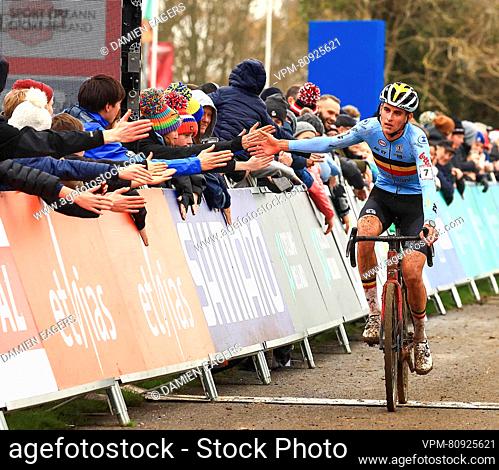 Belgian Yorben Lauryssen crosses the finish line at the men's U23 race of the World Cup cyclocross cycling event in Dublin, Ireland