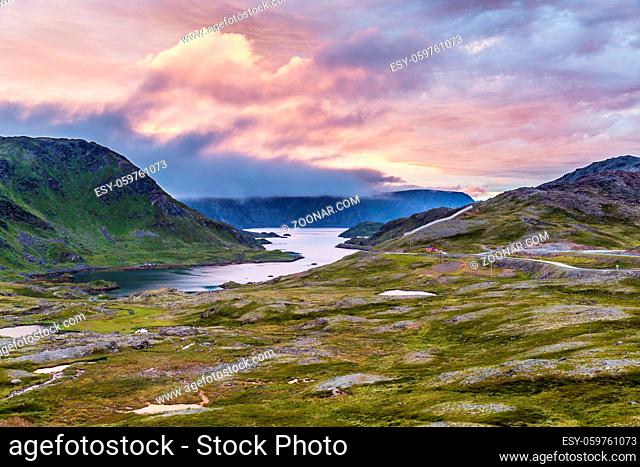 Panoramic landscape with midnight sun in nothern Norway