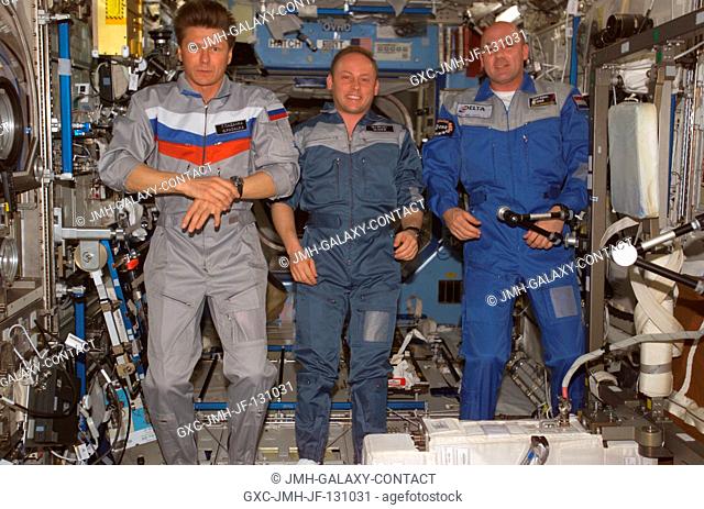 Cosmonaut Gennady I. Padalka (left), Expedition 9 commander; astronaut Edward M. (Mike) Fincke, NASA ISS science officer and flight engineer; and European Space...