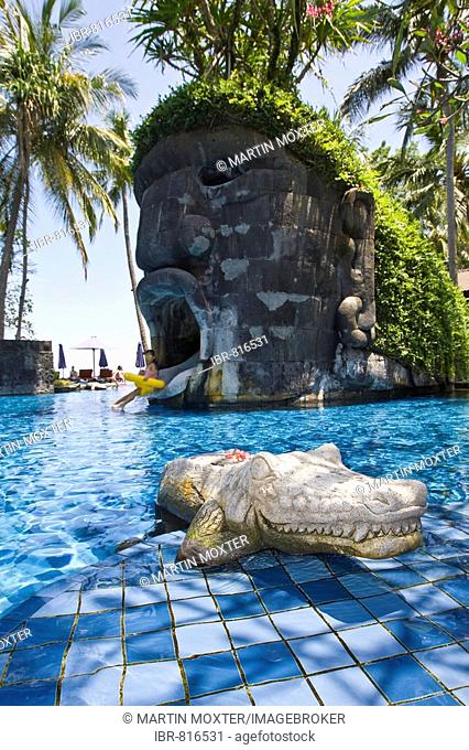 Pool area, stone crocodile, Sheraton Hotel near Senggigi, Lombok Island, Lesser Sunda Islands, Indonesia, Asia