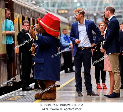 The Duke and Duchess of Cambridge and Prince Harry join children from the charities they support on board Belmond British Pullman train at Paddington Station