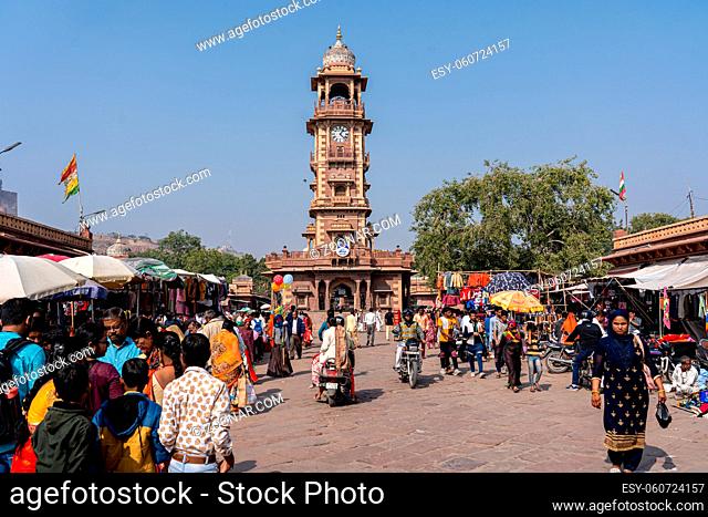 Jodhpur, India - Decembe 9, 2019: The clock tower and people at Sardar Market in the historic city centre