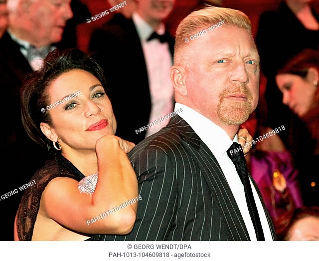 FILED - 28 November 2013, Germany, Hamburg: Tennis legend Boris Becker and his wife Lilly attending the premiere of the musical ""The phantom of the opera""