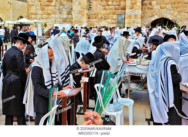 Many religious Jews in tallit