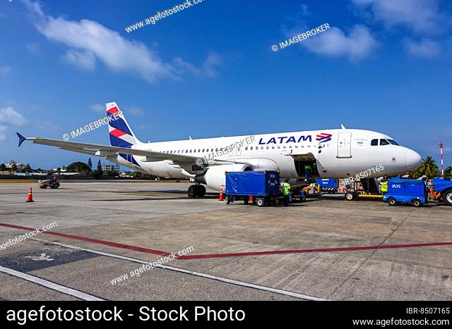 A LATAM Airlines Airbus A320 aircraft with registration CC-BAQ at San Andres Airport, Colombia, South America