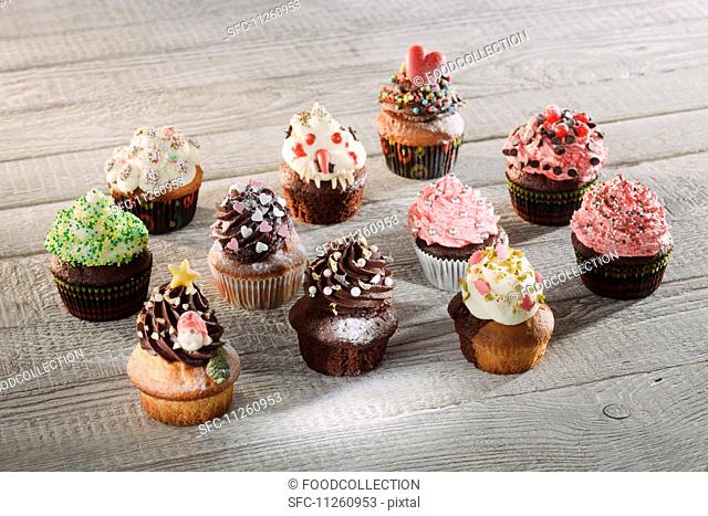 Colouful cupcakes decorated with various different creams