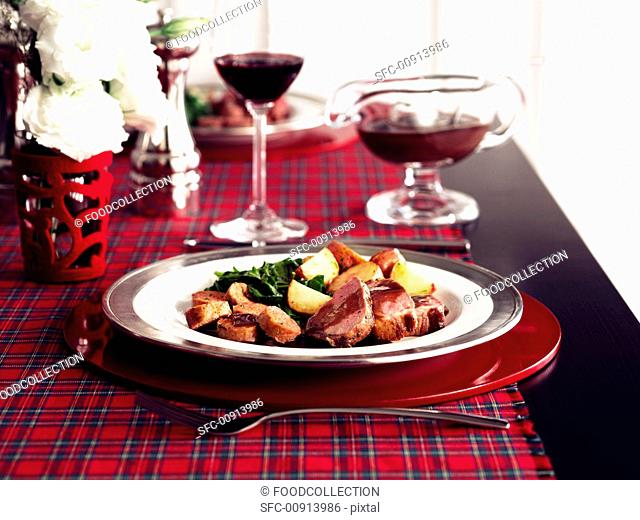 Veal with potatoes and gravy