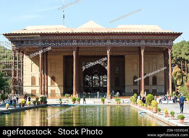 ISFAHAN, IRAN - OCTOBER 13, 2016: People visiting Chehel Sotun Palace on October 13, 2016 in Isfahan, Iran