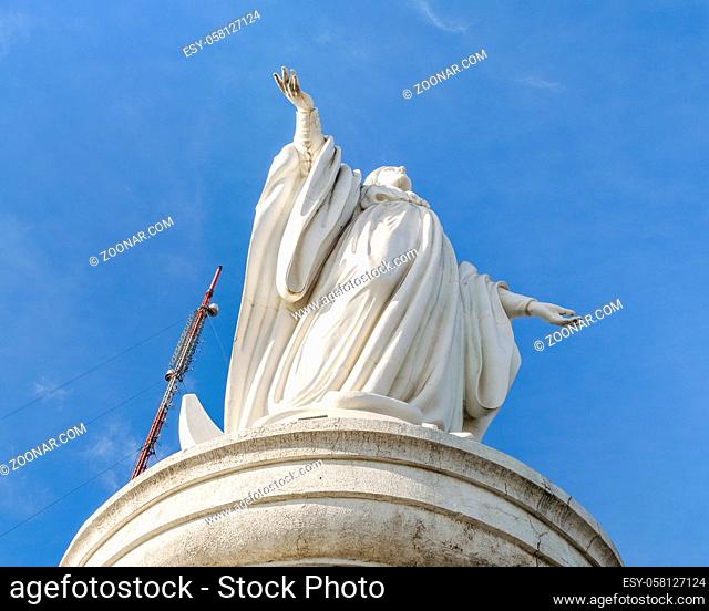 Low angle shot virgin mary scuplture at top of san cristobal hill in santiago de chile city, chile