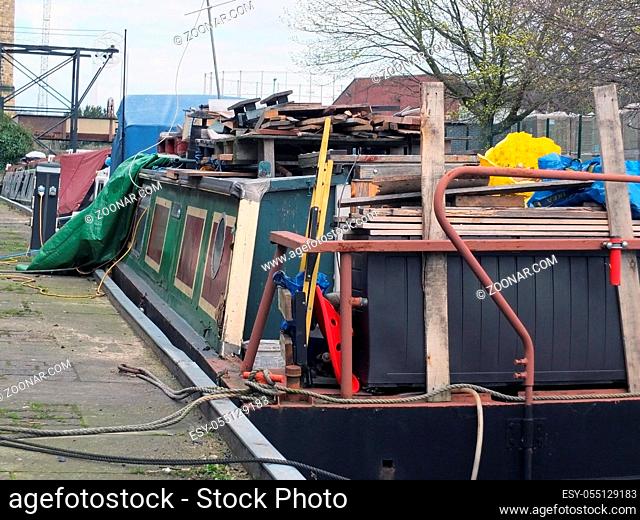 cluttered houseboat on a converted barge in huddersfield west yorkshire