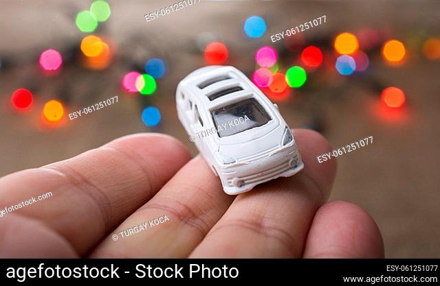 Toy car as a transportation device with lights behind
