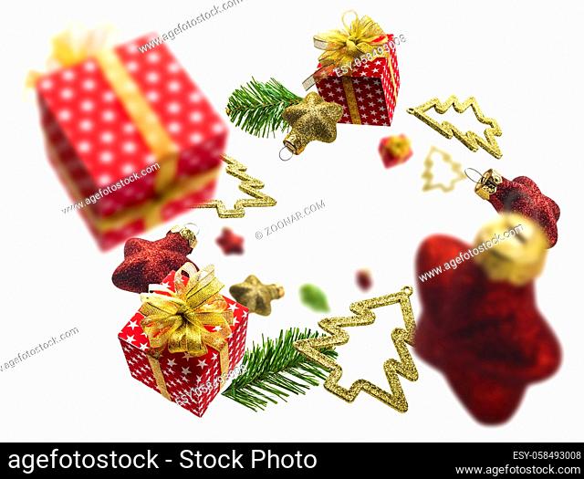 Christmas decorations and gifts levitate on a white background
