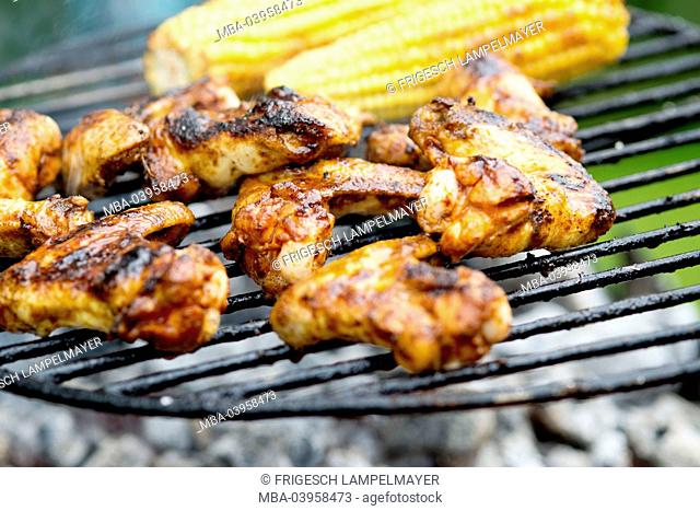 chickenwings with maize from the grill