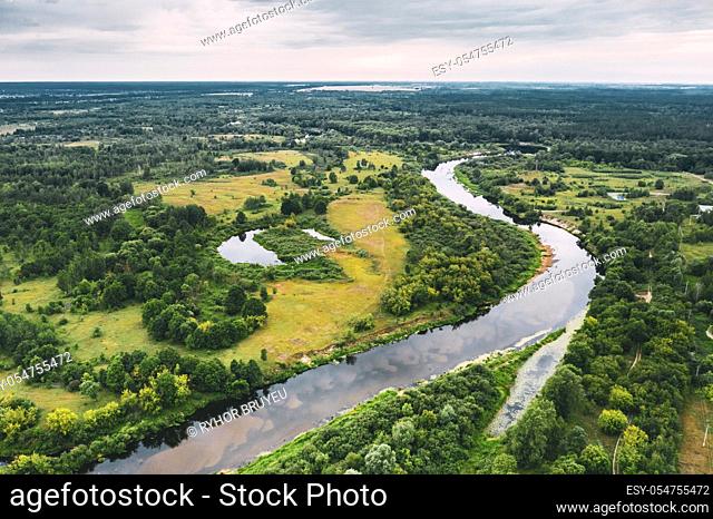 Aerial View Green Meadow, Forest And River Landscape. Top View Of Beautiful European Nature From High Attitude In Summer Season. Drone View