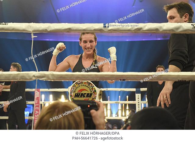 German kickboxer Julia Irmen rejoices over her victory after the WKU World Championship in kickboxing fight against Mellony Geugjes of the Netherlands at Stekos...