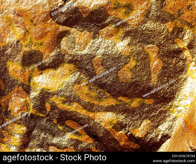 relief surface of golden abstract colorful pattern