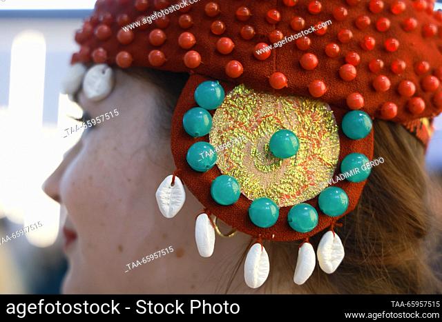 RUSSIA, MOSCOW - DECEMBER 21, 2023: A woman attends the opening of Karelia Republic Day at the Russia Expo international exhibition and forum at the VDNKh...