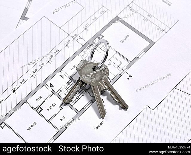 Bunch of keys lies on a floor plan drawing of an apartment